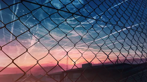 sunset-through-fence